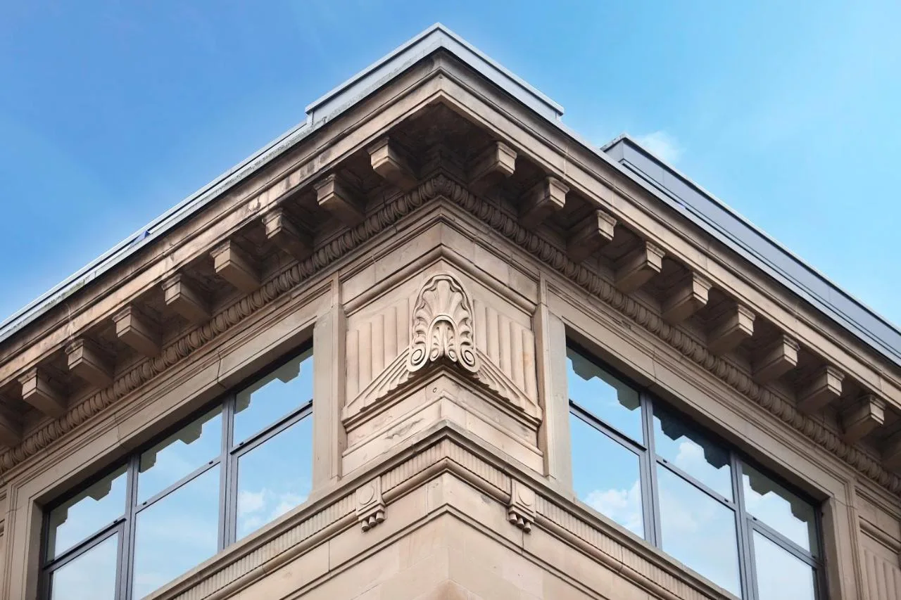 an architectural detail of a building with windows at Hotel Indigo Glasgow by IHG in Glasgow